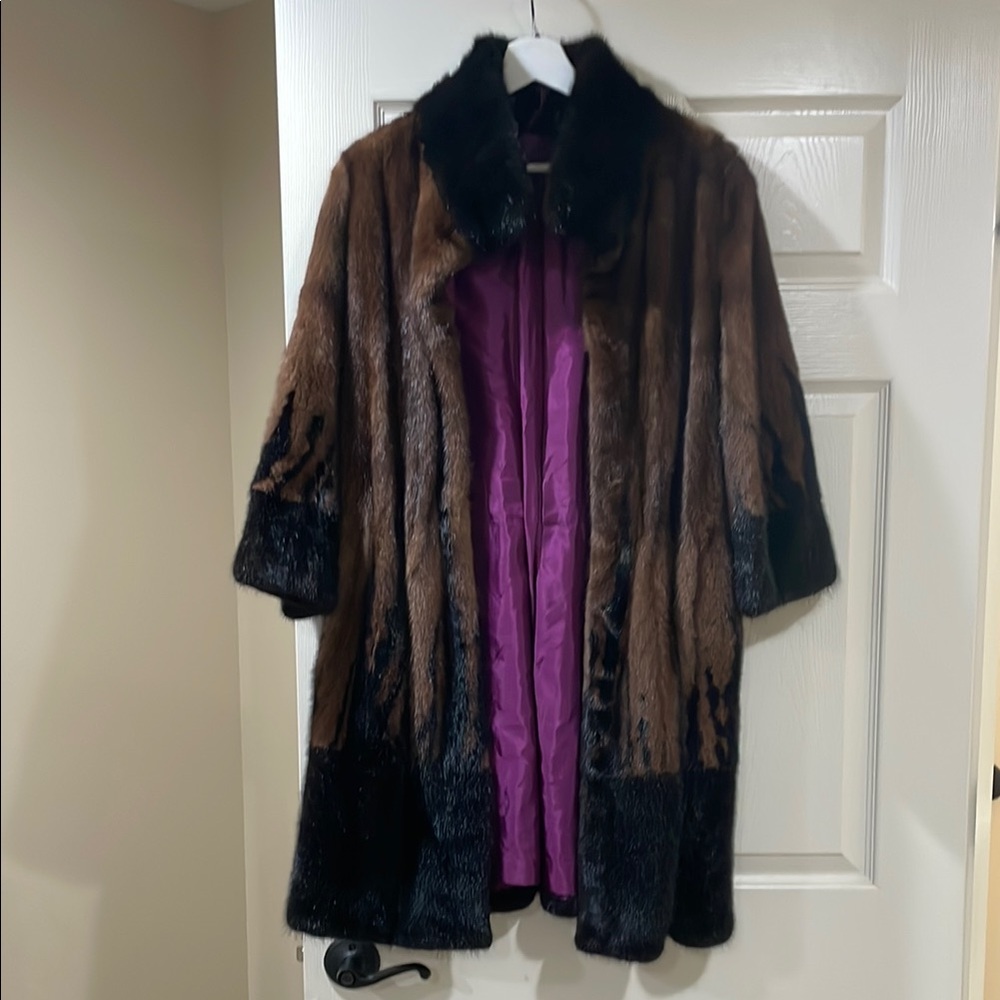 Elegant Brown and Black Fur Coat with Purple Lining